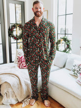 This cozy pajama set features an array of sleighs, Christmas trees, reindeer and more. Perfect for the holidays, this Mystic Forest print brings festive charm and timeless style. Made from a soft, brushed fabric, these holiday plaid pajamas are ideal for cozy mornings, matching family photos, or relaxing by the fire. This family matching Christmas pajama set offers both comfort and classic holiday style you’ll love all season long.